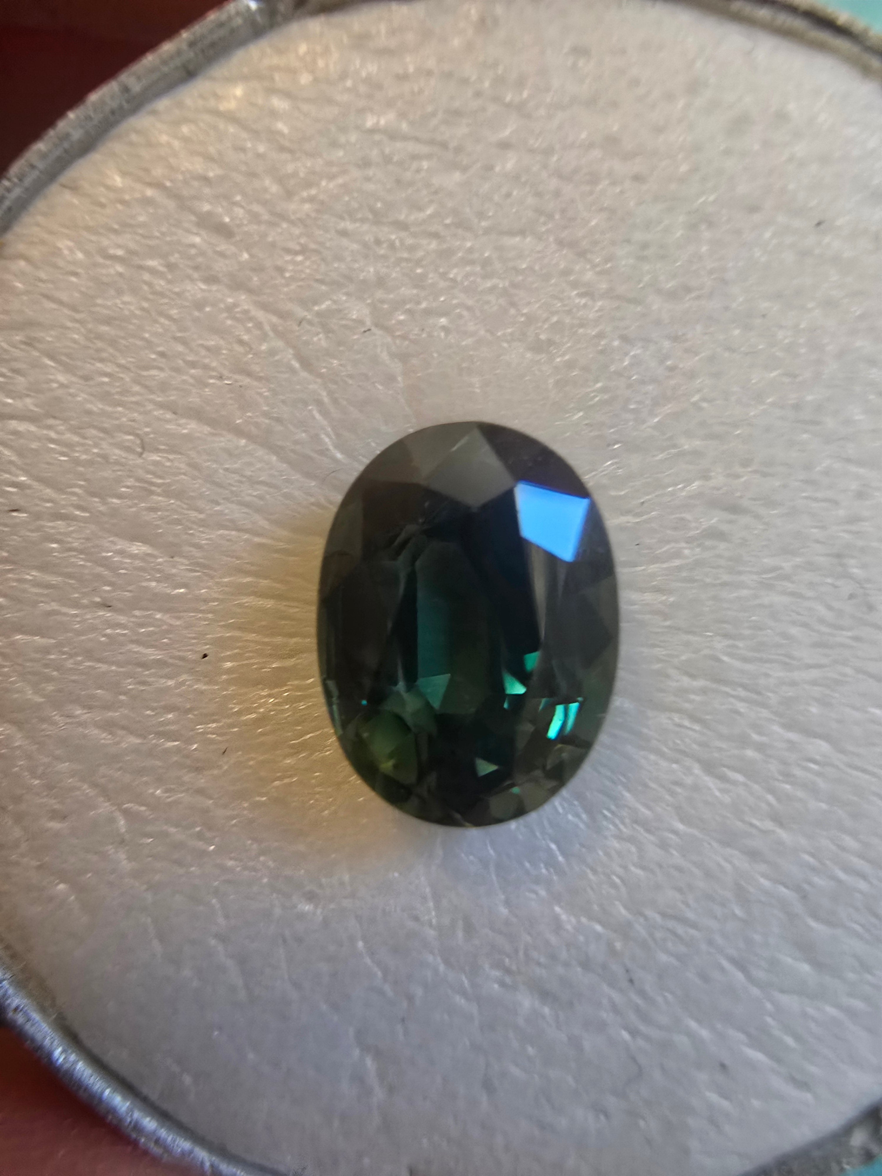 Green Australian Sapphire 2.31ct Oval — Ministry of Gems