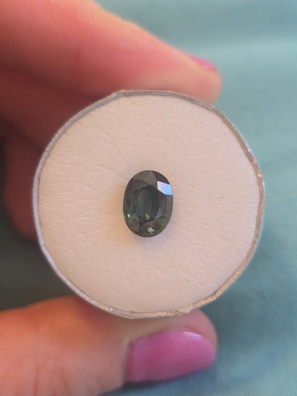 Green Australian Sapphire 2.31ct Oval — Ministry of Gems