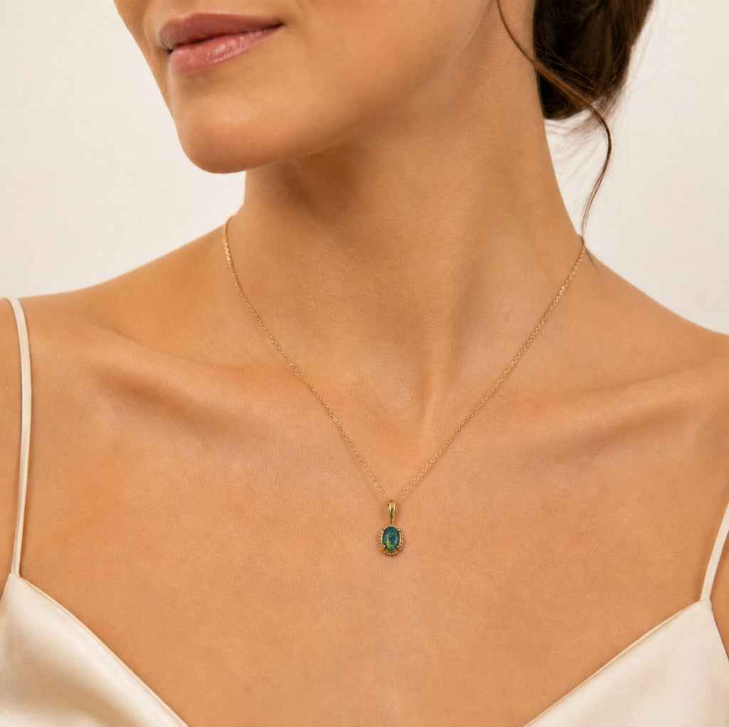 Model wearing the Quiet Drop australian opal pendant in 14K Gold — Ministry of Gems