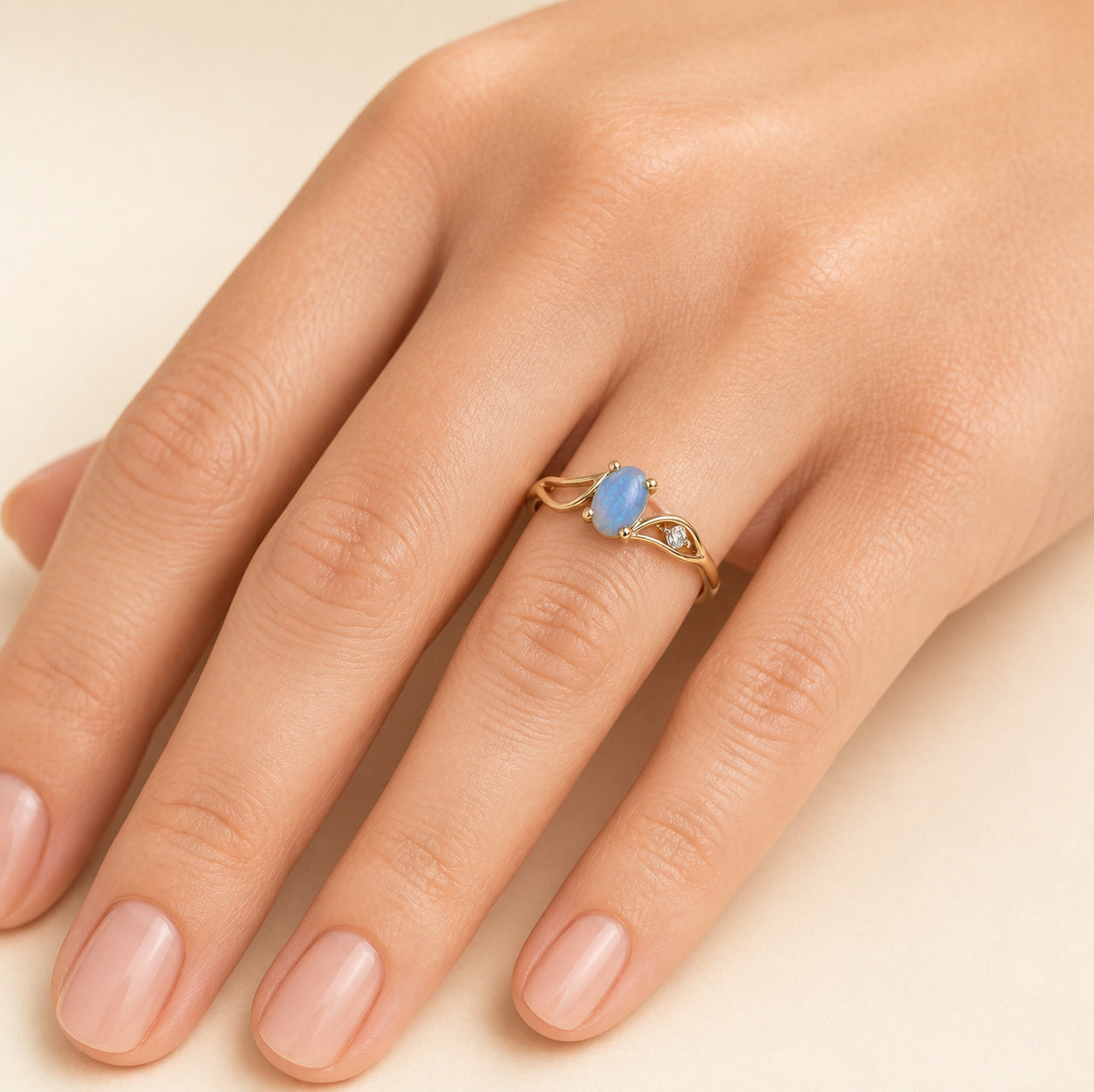 Model wearing the Everyday Blue australian opal ring in 14K Gold — Ministry of Gems