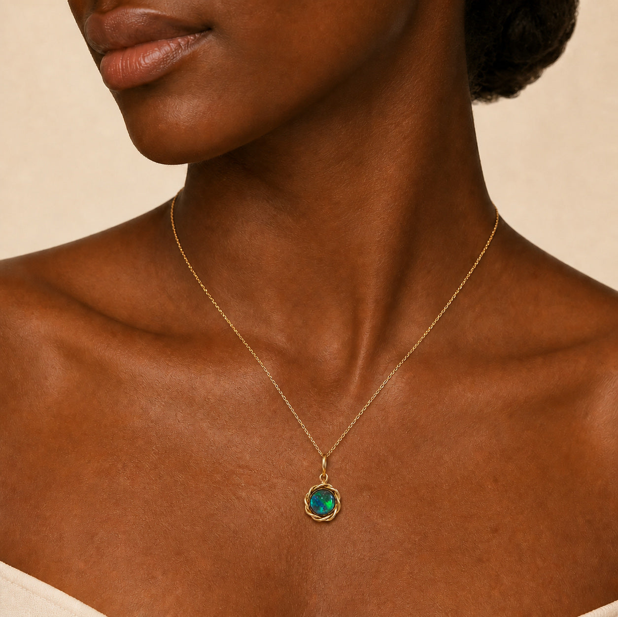 Model wearing the Riverbend I australian opal pendant in 14K Gold — Ministry of Gems