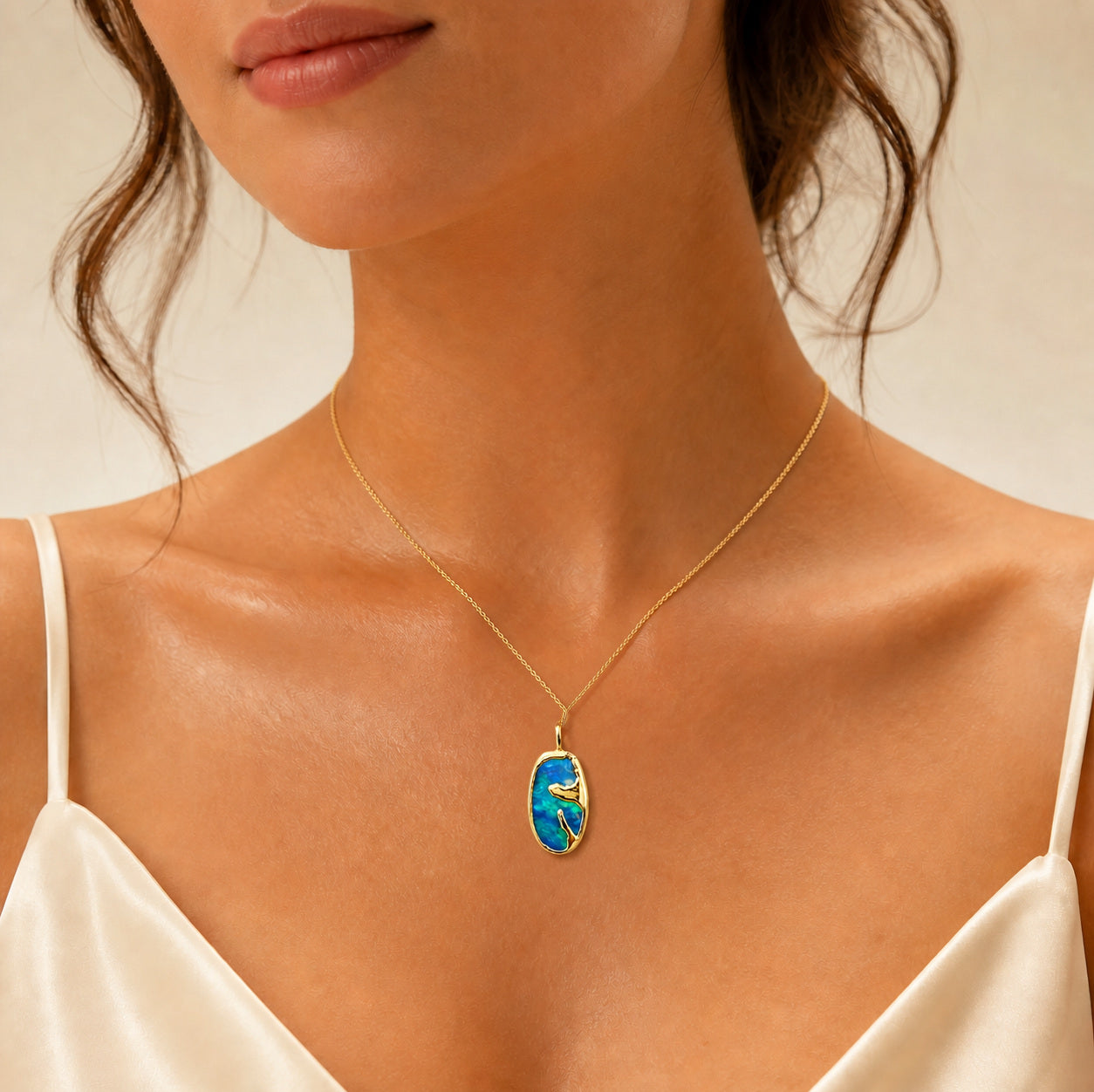 Model wearing the Strata II boulder opal pendant in Gold-Plated Sterling Silver — Ministry of Gems