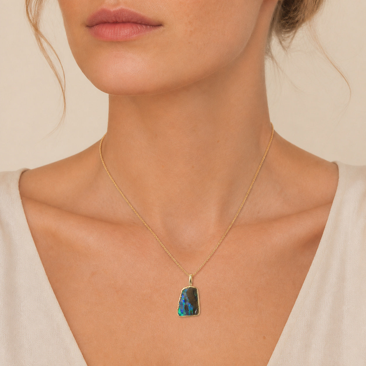 Model wearing the Strata III boulder opal pendant in Gold-Plated Sterling Silver — Ministry of Gems