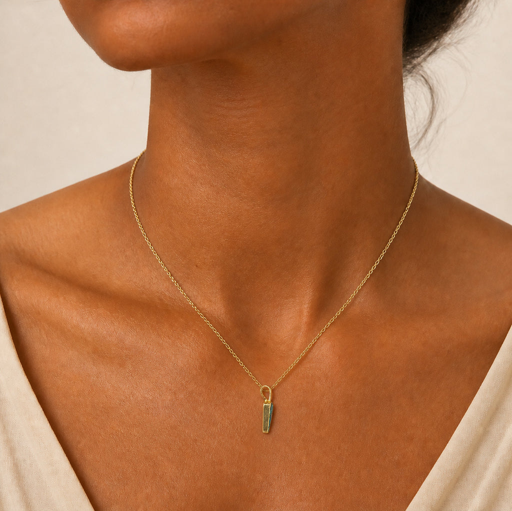 Model wearing the Strata IV boulder opal pendant in Gold-Plated Sterling Silver — Ministry of Gems