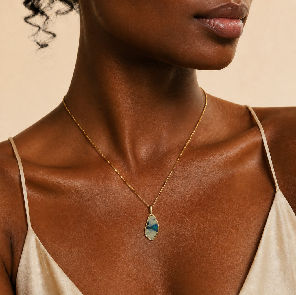 Model wearing the Strata V boulder opal pendant in Gold-Plated Sterling Silver — Ministry of Gems