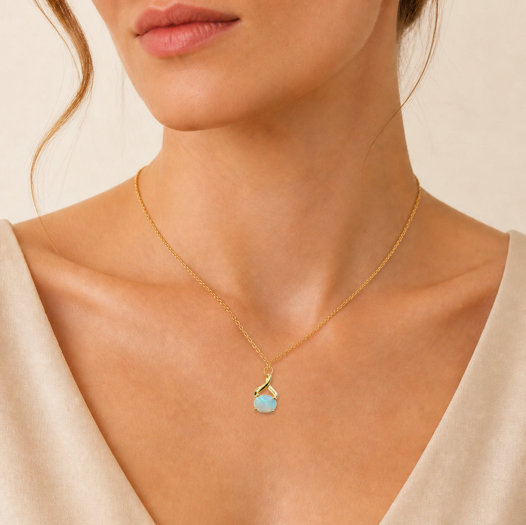 Model wearing the Golden Sweep australian opal pendant in 18K Gold — Ministry of Gems
