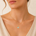Model wearing the Golden Sweep australian opal pendant in 18K Gold — Ministry of Gems