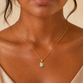 Model wearing the Sister Sweep australian opal pendant in 18K Gold — Ministry of Gems
