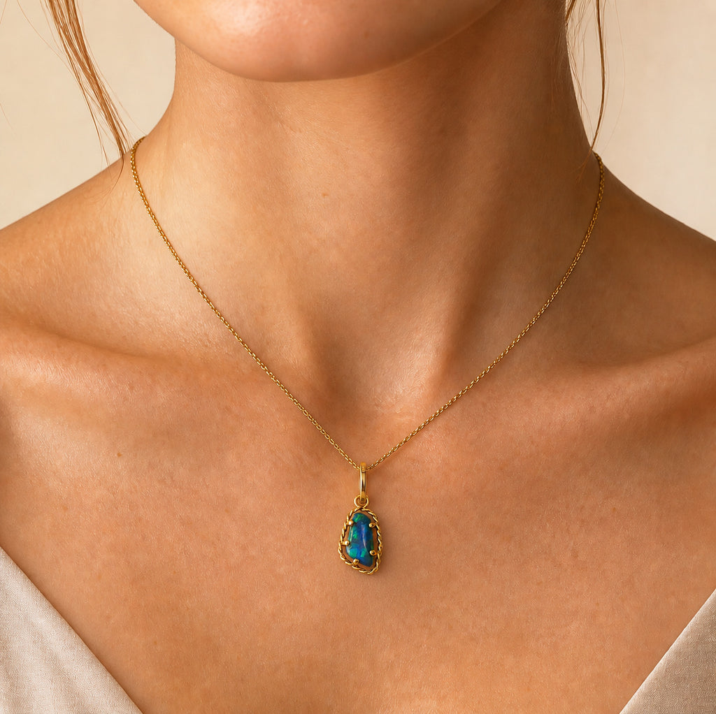 Model wearing the Goldline I australian opal pendant in 14K Gold — Ministry of Gems