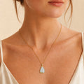 Model wearing the Boulder Shard II boulder opal pendant in Gold-Plated Sterling Silver — Ministry of Gems