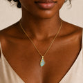 Model wearing the Boulder Shard III boulder opal pendant in Gold-Plated Sterling Silver — Ministry of Gems