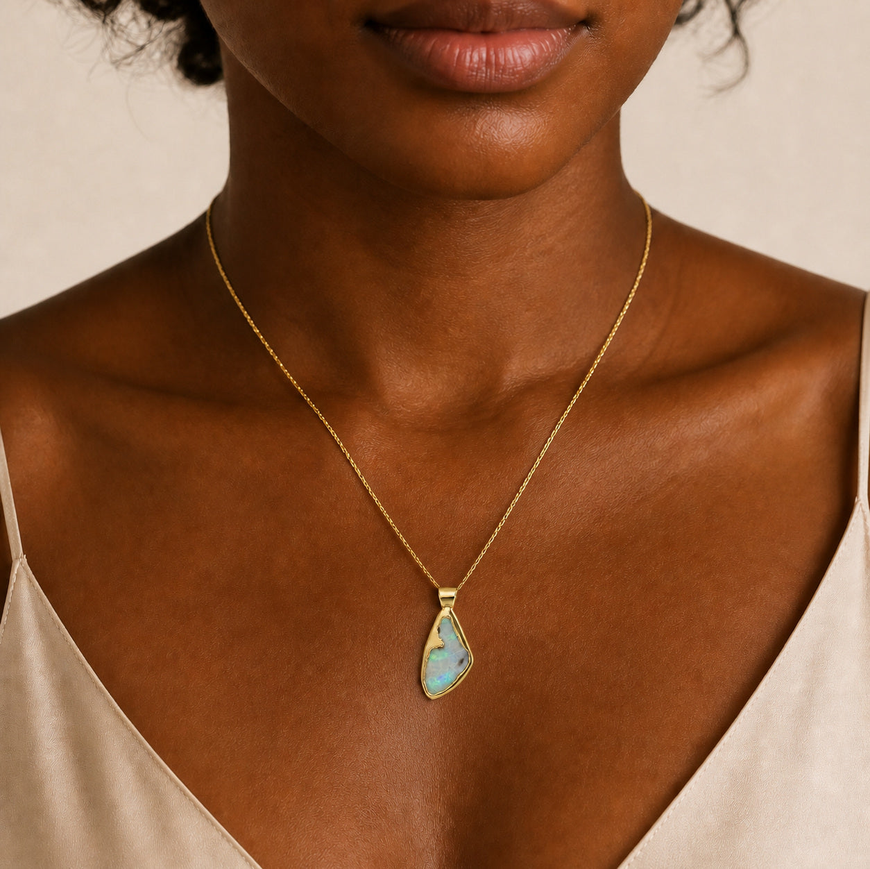 Model wearing the Boulder Shard III boulder opal pendant in Gold-Plated Sterling Silver — Ministry of Gems