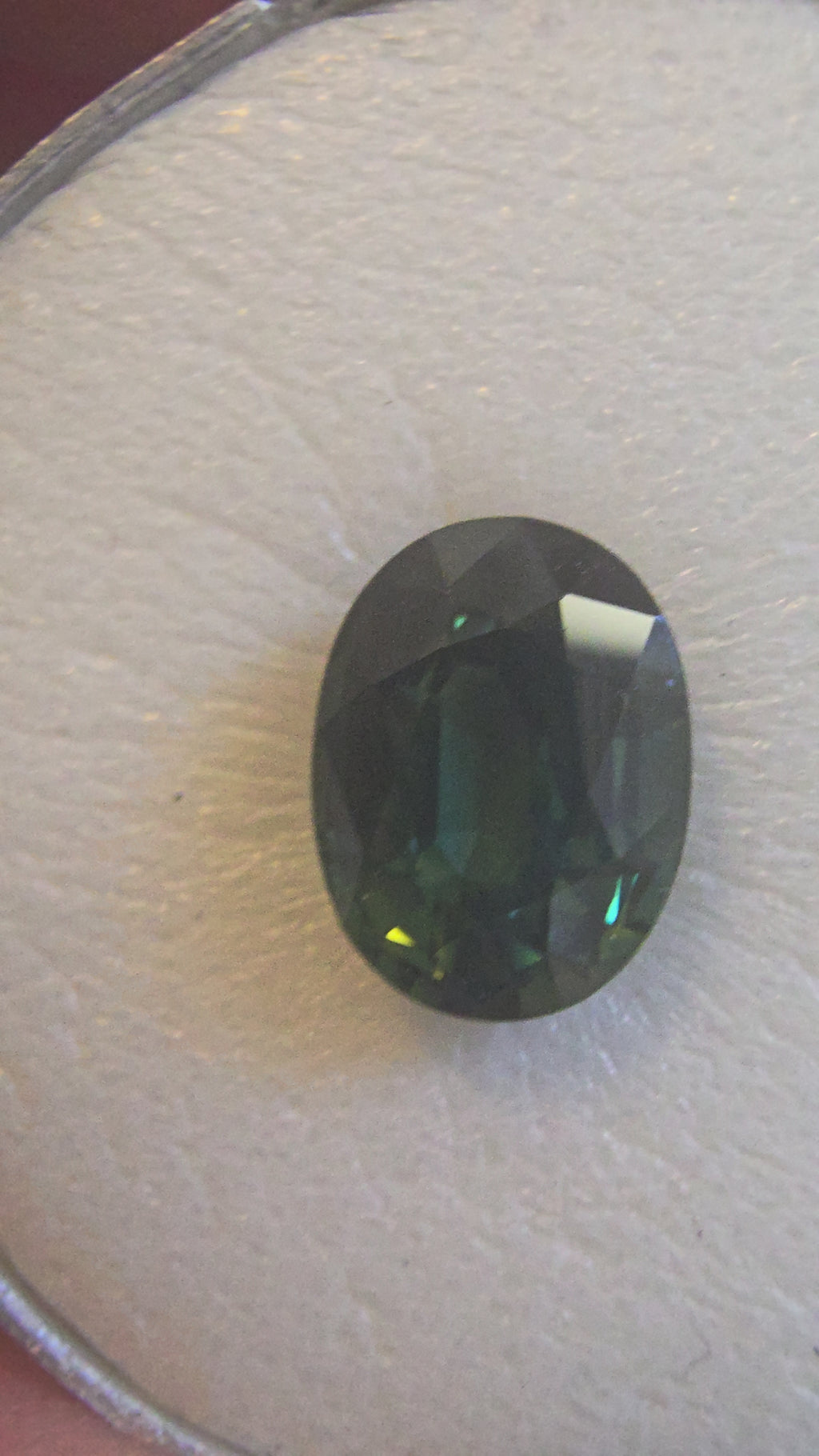 Green Australian Sapphire 2.31ct Oval — Ministry of Gems
